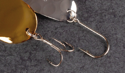 Close up photo of treble and single hooks